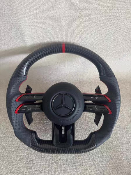 Volante Mercedes-AMG Performance - piel perforada con testigo rojo